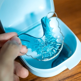 Retainer in a carrying case