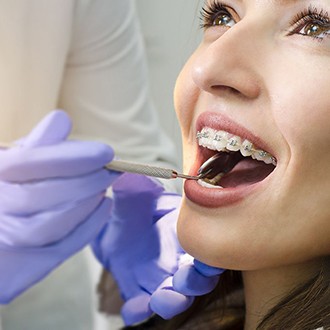 a patient with braces receiving emergency treatment