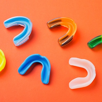 an assortment of colorful mouthguards