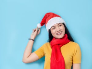 Woman in Santa hat with braces in Dayville