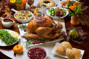 Dinner table full of holiday foods to eat with braces in Dayville