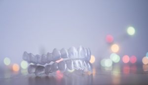 Invisalign in Dayville in front of Christmas lights